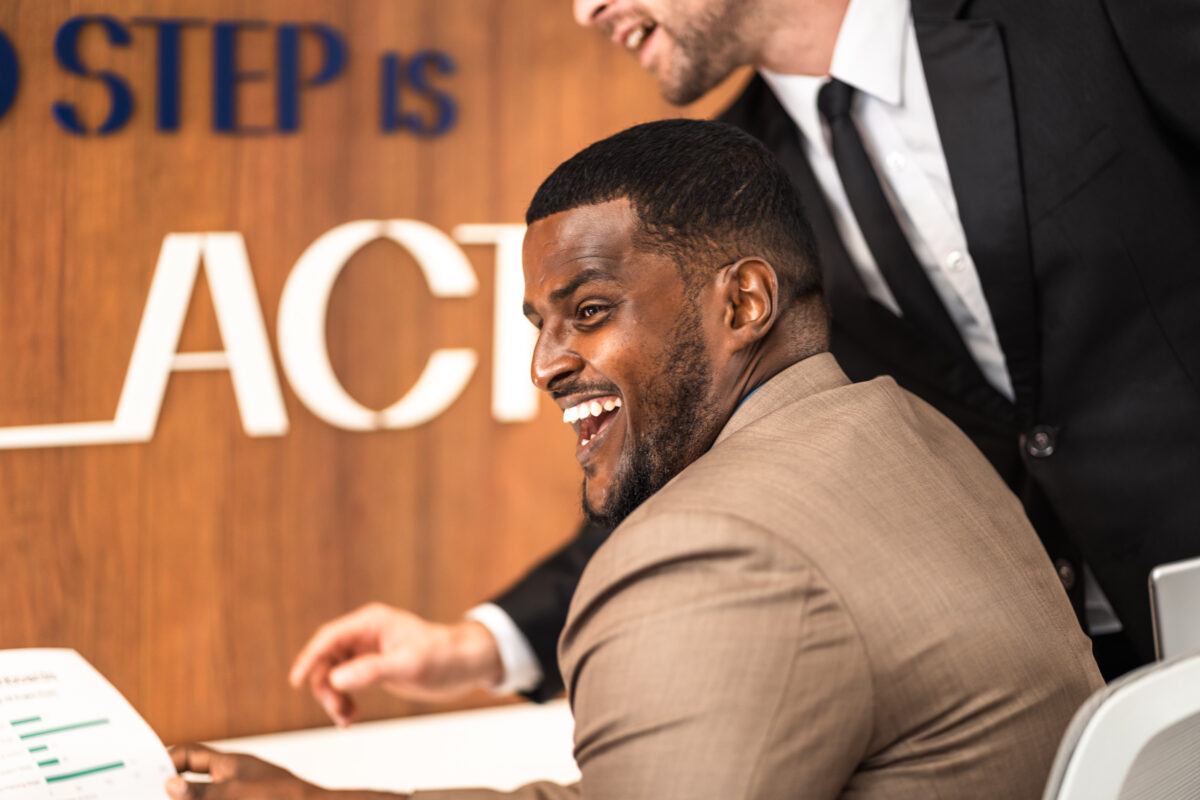 Mature caucasian ceo businessman leader with diverse coworkers t
