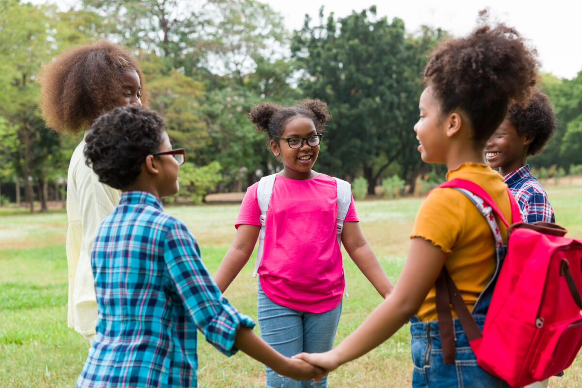 Group of african american children joining their h 2026 01 11 10 03 05 utc